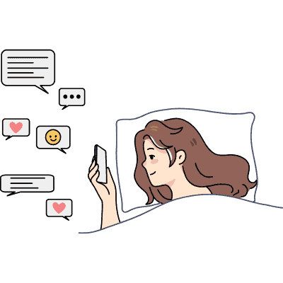 woman texting in bed